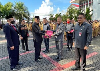 Tiga Pejabat Terima SK Kenaikan Pangkat  di Upacara HUT Minahasa Ke 594
