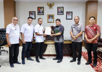 Pj Bupati Minahasa Teken Naskah Hibah dan Serah Terima BMN