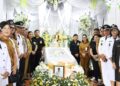 Wakil Bupati Minahasa Vanda Sarundajang Hadiri Ibadah Pemakaman Hukum Tua Desa Lemoh Alm. Ilidius Walewangko