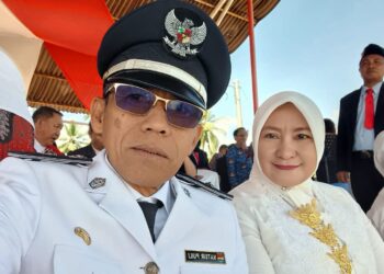 Hukum Tua Desa Ratatotok Hadiri Upacara Peringatan HUT RI Ke 80