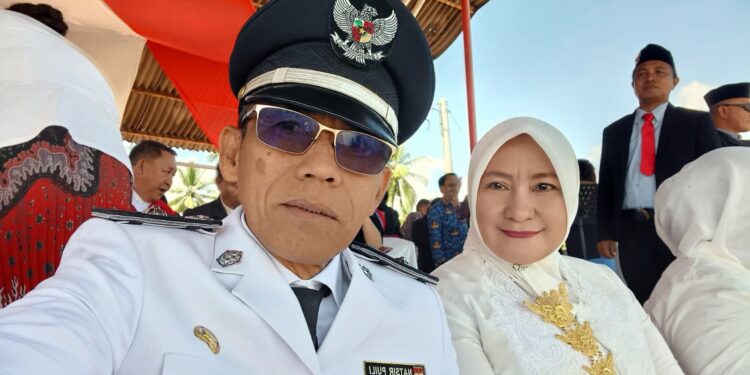 Hukum Tua Desa Ratatotok Hadiri Upacara Peringatan HUT RI Ke 80